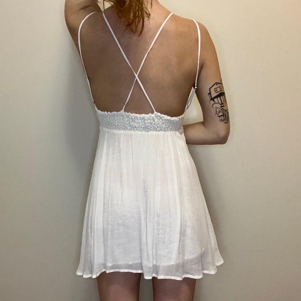 Super cute open back white dress!